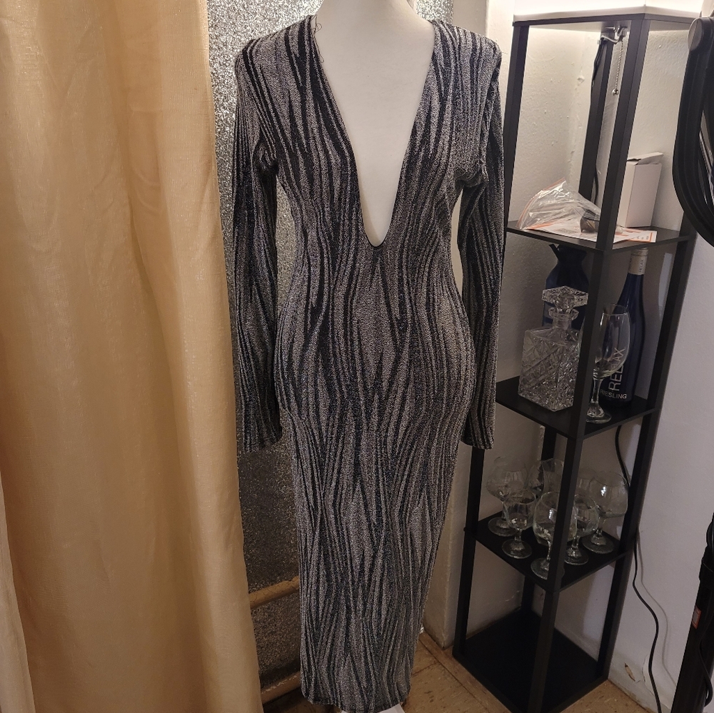 Silver glitter and black dress, size medium. Alot of stretch